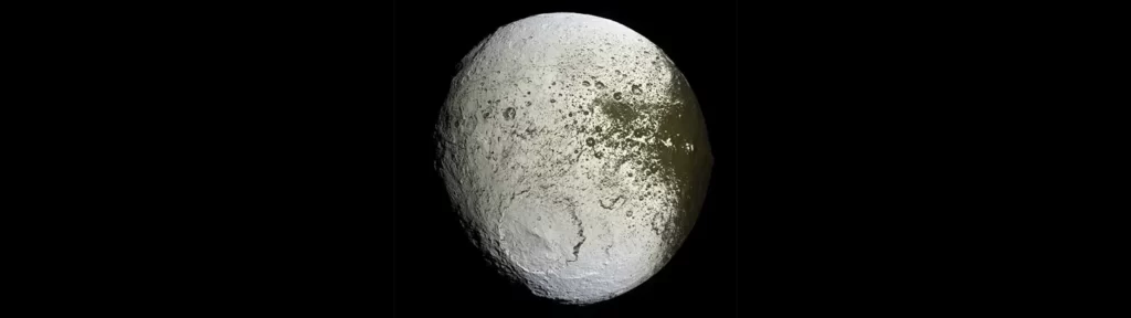 Iapetus '' Two-Faced Surface A Mystery Solved